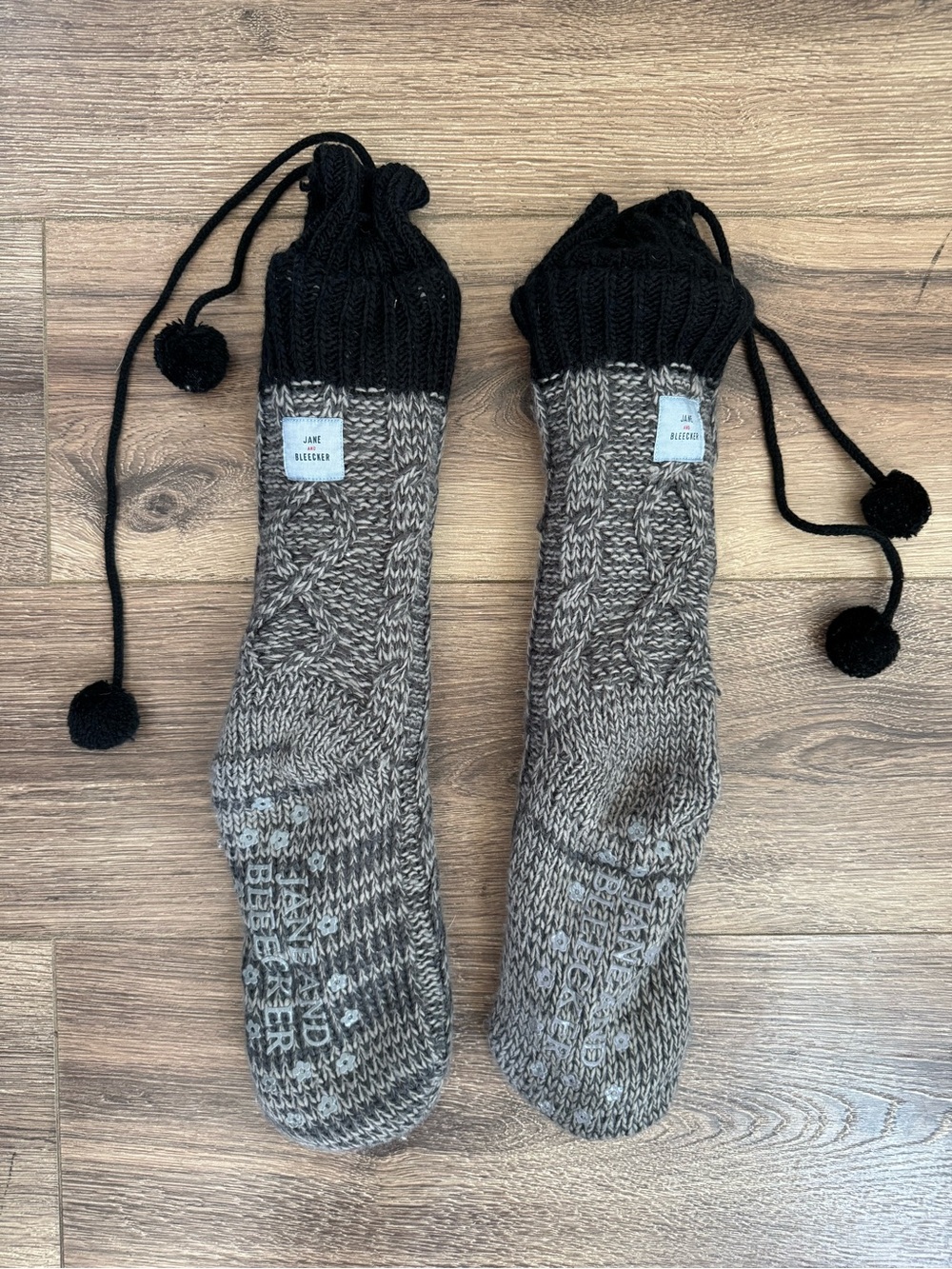 Jane and Bleecker Knee-High Cable Knit Slipper Socks, Pom Drawstring, Black Grey